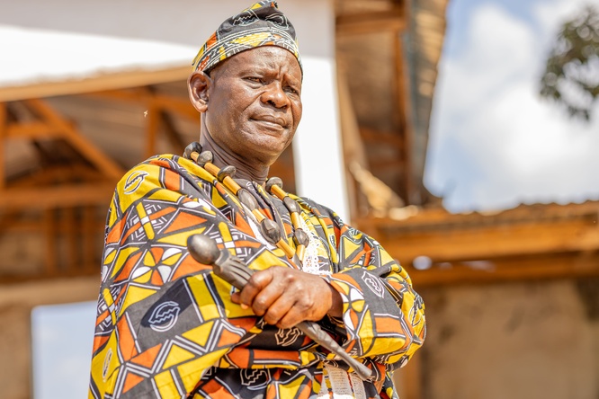 A man in a colorful outfit.