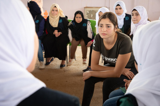 UNHCR Goodwill Ambassador Yusra Mardini meets TIGER girls during a visit to a UNHCR-supported community centre in the Zaatari refugee camp in Jordan. 