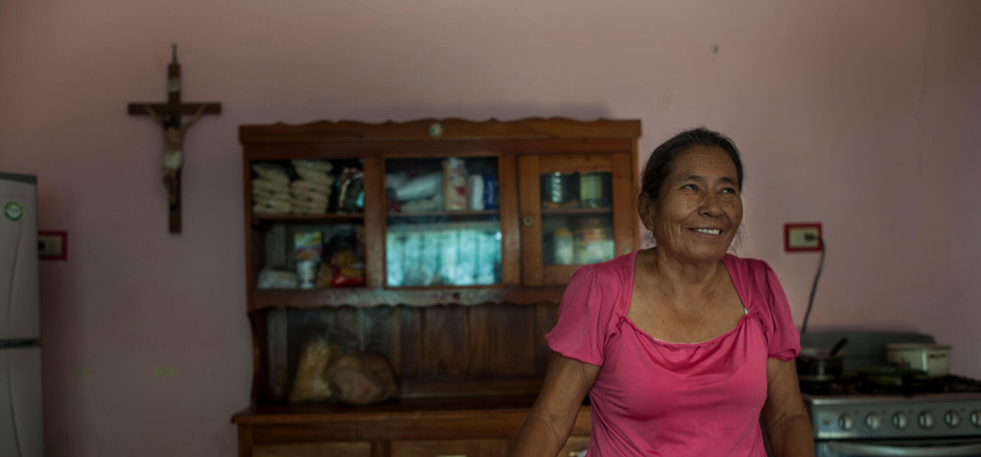 Elder woman escaped from violence of El Salvador, feels happy in her new life in Chiapas, Mexico.