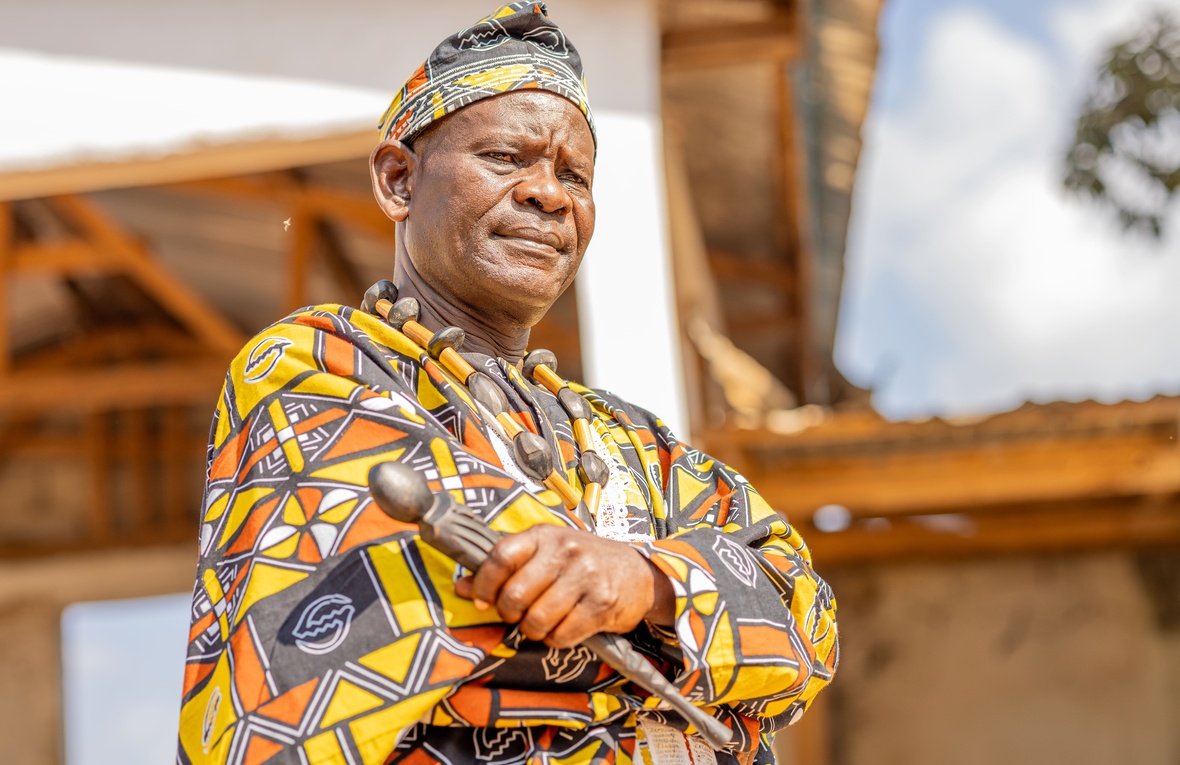 A man in a colorful outfit.