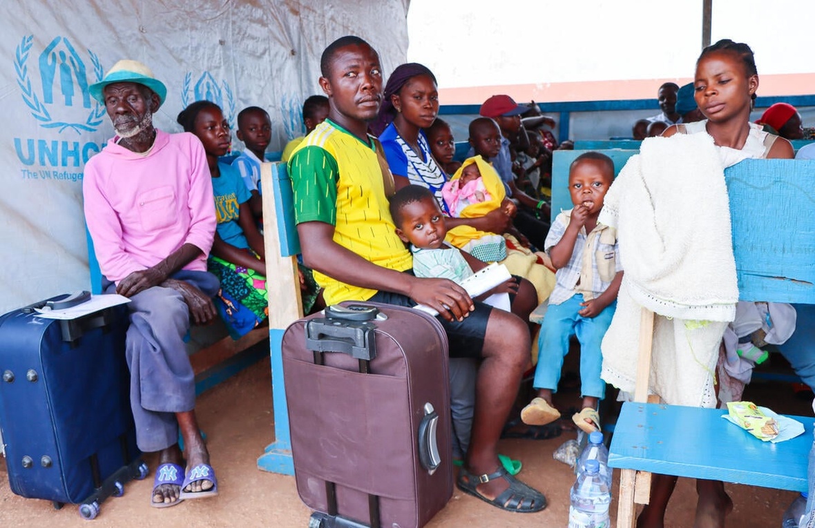 Returning refugee families wait at a transit centre in the Central African capital Bangui