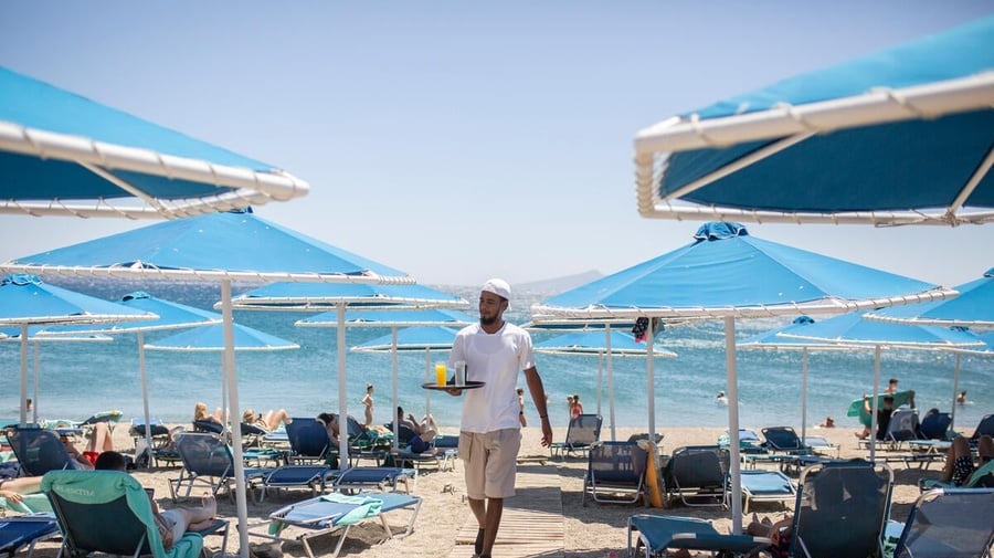 Greece. Refugees on Kos island find employment in the tourism sector.