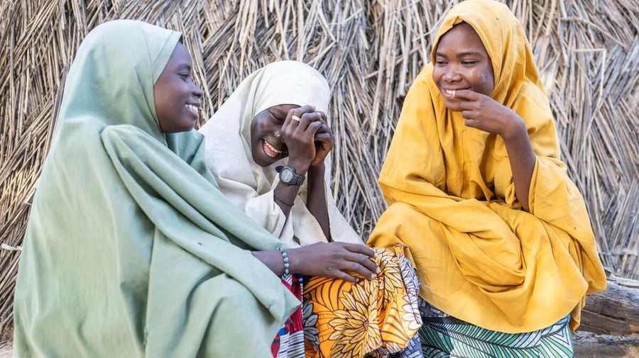 From left to right, Fatila Lawan, Rukaya Abdullahi and Aisha Muhammed playing together in El Miskin Camp, Maiduguri.