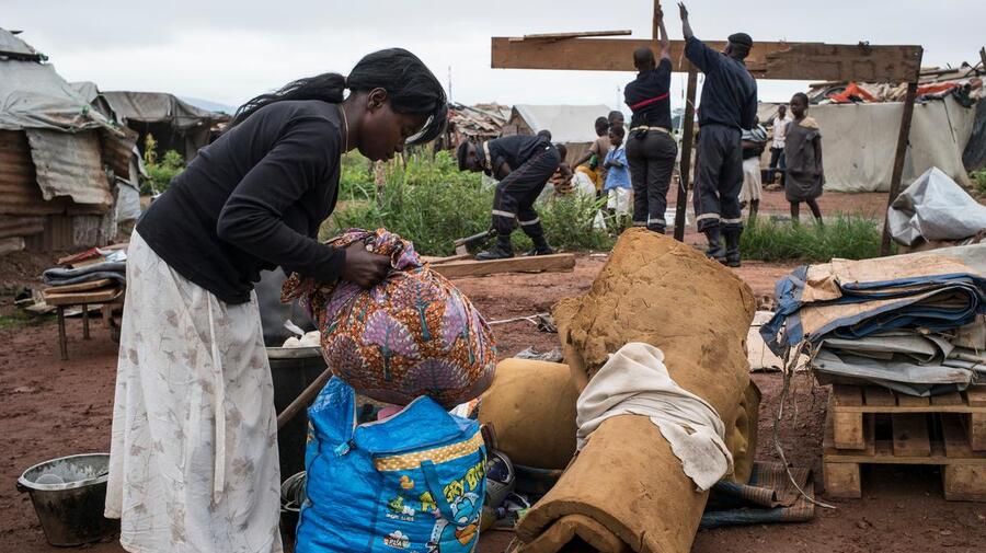Central African Repulic. Displead people leaving M'Poko site to rebuild their life
