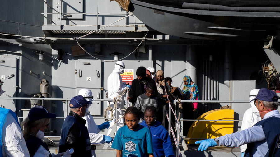 Italy. Migrants and refugees from Africa land at the Port of Messina in Sicily