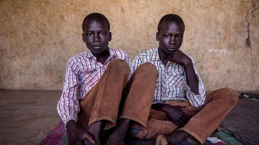 Kenya. South Sudan refugee twins Jacob and Simon, 14 in Kakuma Refugee Settlement