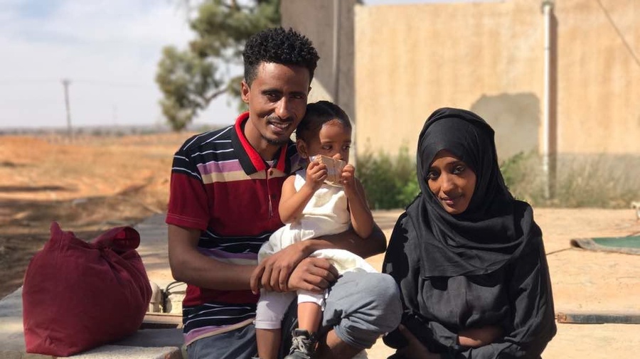Refugees Mohamed and Mariam seen outside the detention center from where they were evacuated to Niger
