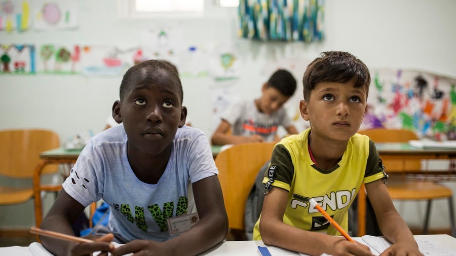 Greece. Refugee children in Kos waiting for a chance to attend school