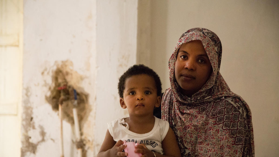 Libya. Sudanese caregiver hosts fellow refugees through UNHCR programme