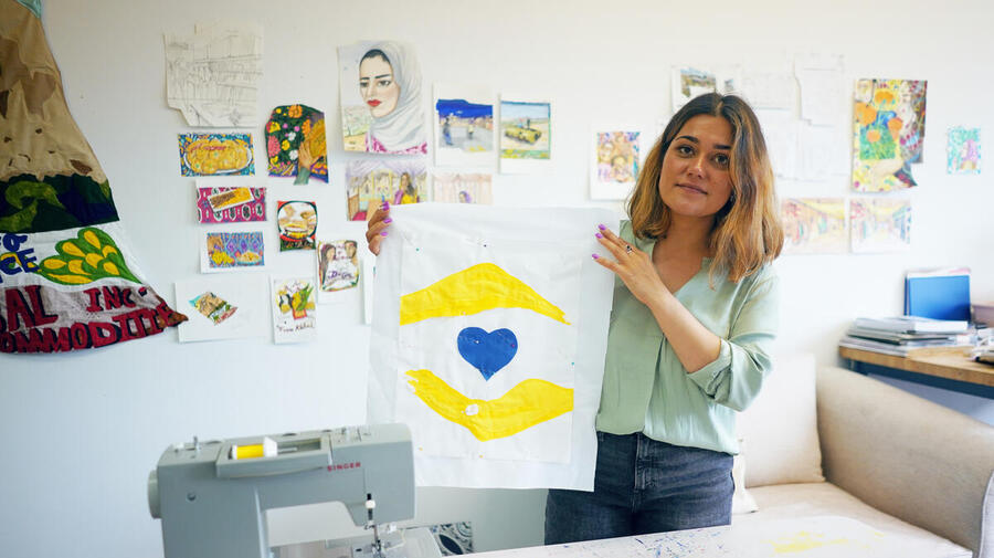 United States. Afghan refugee design World Refugee Day logo