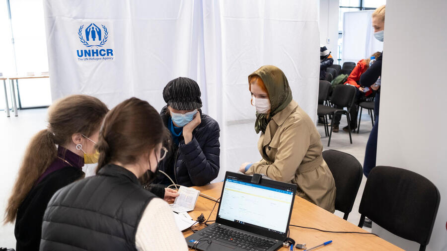 Poland. Refugees from Ukraine wait to register for cash assistance in Warsaw