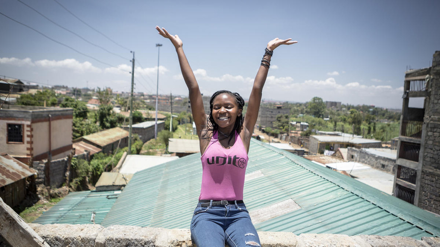 Kenya. Burundian refugee student on rooftop of student housing in Nairobi