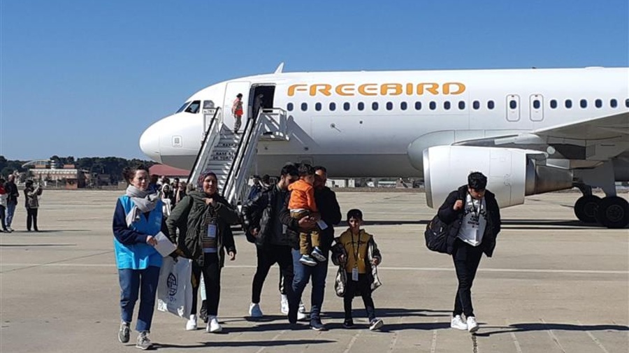 UNHCR, the UN Refugee Agency, and the International Organization for Migration (IOM) welcoming a group of 89 Syrian refugees at Torrejón military airport in Madrid.